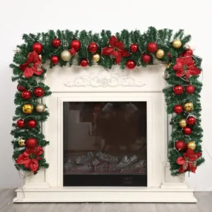 Decorated artificial pine Xmas garland with red gold balls poinsettia for white fireplace mantel